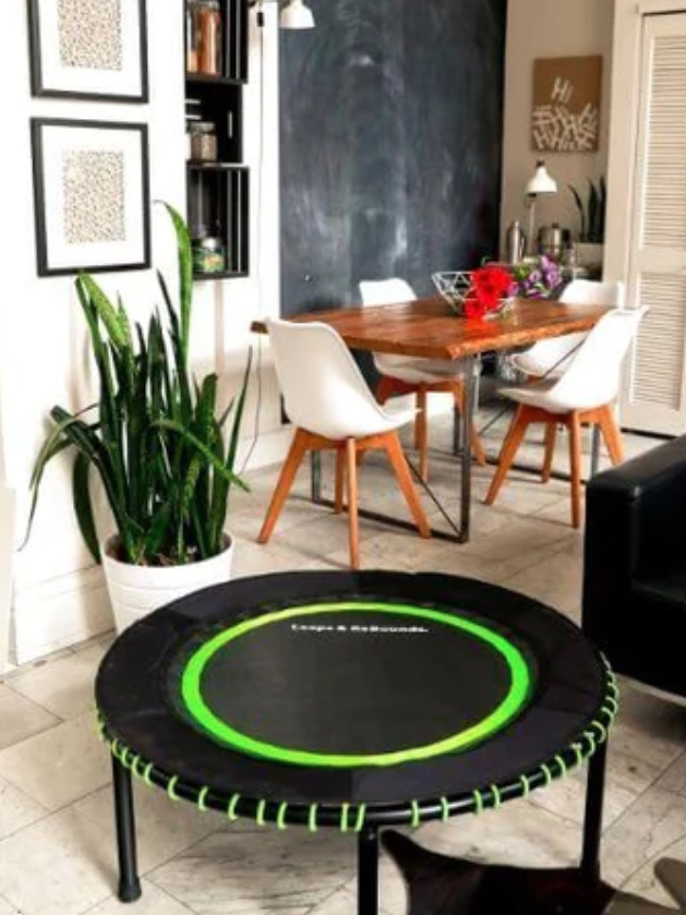 A trampoline from Leaps and Rebounds in a kitchen.